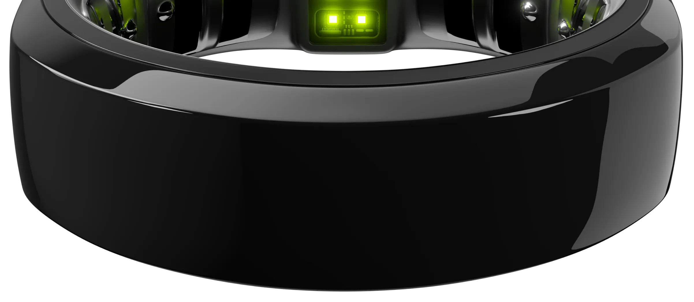 A close-up view of a sleek black ring featuring embedded technology components. Green LED lights are visible on the inner surface, suggesting functionality related to health or fitness tracking. The exterior has a shiny, polished finish.